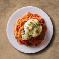 Chicken Parmesan Pasta · Covered with parmesan cheese. Served with garlic bread and marinara sauce.