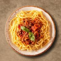 Meat Sauce Pasta · Covered with parmesan cheese. Served with garlic bread and marinara sauce.