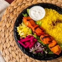 Chicken Shish Kabob · Chunks of chicken breast marinated in our own marinade and char-broiled to perfection.