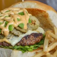 Fried Jalapeño Burger · Shredded lettuce, pepperjack cheese, avocado and fried jalapenos, drizzled with chipotle mayo.
