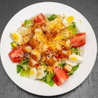 Crispy Chicken Salad · crispy chicken and cheddar cheese over romaine with tomato, carrots, cucumber, bell peppers,...