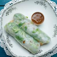 Spring Rolls · Two fresh rolls wrapped in rice paper with mixed vegetables and your choice of shrimp, BBQ p...