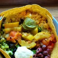 Veggie Tacoz Bowl · Comes with rice, black beans, your choice of a veggie, toppings, and topped with chips