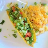1 Kids Veggie Taco With Plant-Based Protein  · Includes a wacky side. Choose a shell, one veggie protein, and add toppings. Additional vegg...