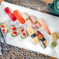 Sushi Dinner · Seven pieces of assorted nigiri and six pieces California roll. Served with miso soup and sa...
