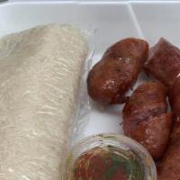 Hmong Sausage & Sticky Rice · Authentic Hmong Sausage served with rice and our SPICY homemade chili dipping sauce.