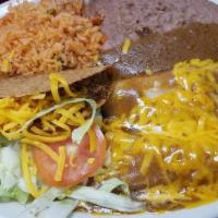 Jalisco Burrito W/Rice & Beans · Your choice of meat, covered with chile gravy and cheese with rice and beans as a plate
