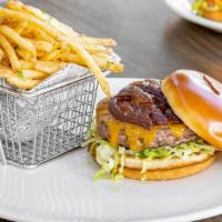 Signature Burger · Double Patty Smash Burger, Lettuce, Tomato, Cheddar Cheese, Secret Sauce, Caramelized Onions...