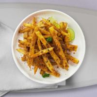 Spiced Fries · Idaho potato fries cooked until golden brown and garnished with seasoning.
