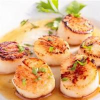 Scallops · Succulent Sea Scallops from the East Coast. Wrap them in bacon, sauté them in butter, make a...