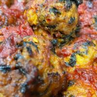 Turkey With Spinach Meatballs In Special Apricot Sauce · 5 pieces.