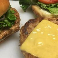 Turkey Burger · Ground turkey patty served on a bun. All-natural with provolone, lettuce, tomato, and red on...