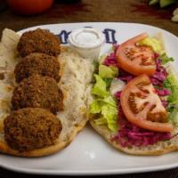 Falafel Sandwich · Vegetarian. Four pieces of freshly home made falafels. Served with our own tahini sauce.