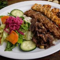 Mixed Grill · Gluten-free. This house specialty is a delicious combination of Adana, tavuk Adana, beef, ta...