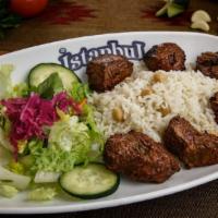 Kuzu (Lamb) Şiş Kebab · Gluten-free. A skewer of lean, tender pieces of lamb. Char-grilled to perfection. Served wit...