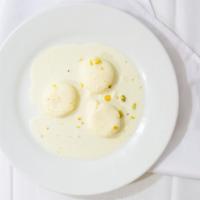 Rasmalai · Homemade cheese simmered with milk and nuts, served cold.