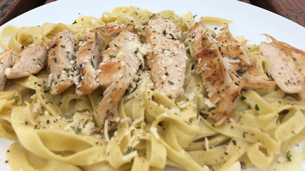 Chicken Alfredo · Fresh cooked chicken breast on a bed of our fettuccine noodles tossed in our Signature Alfredo.  Our Alfredo sauce is as simple yet real as it gets, REAL Parmigiano-Reggiano and Pecorino-Romano cheese grated by us, fresh garlic, heavy cream, salt and pepper.