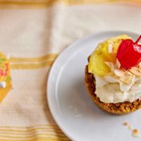 Piña Colada · Cool, creamy coconut and rum pie in a graham cracker crust with fresh pineapple and a marasc...