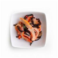 Squid Salad · Calamari, wood ear mushroom, bamboo shoots, and ginger.