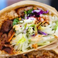 Burrito · Flour tortilla wrapped with fried rice, lettuce, cilantro, beansprouts, red cabbage, carrots...