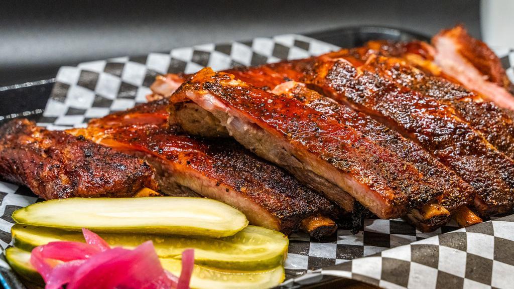 Pork Ribs Full Rack · One full rack of our Texas oak smoked ribs.