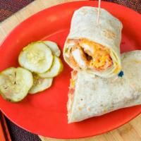 Travis Chicken Wrap · Chicken tenders, lettuce, tomato, cheese and a choice of ranch or mayo