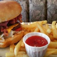 #8 Texas Cheeseburger Combo · BBQ Sauce, Onion Rings, Lettuce, Tomatoes, Bacon, Swiss and American Cheese