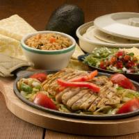 Chicken Fajitas · Flame grilled and rushed to your table in a sizzling skillet with lightly seasoned carameliz...