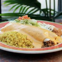 Burrito Con Queso · There's only one way to make our burritos better, smother them in our incredible zesty chees...