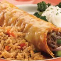 Fajita Burrito · Sizzling tender steak or chicken strips with grilled onions and fresh poblano peppers, stuff...
