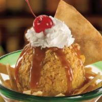 Fried Ice Cream · Paradiso Specialty. What a treat! Cool French vanilla ice cream rolled in a sweet coating an...