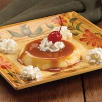 Flan · Top off your dining experience with this classic, creamy custard glazed in caramel.