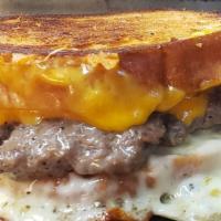 Patty Melt · Two 1/4 lb Patties, buttered and grilled sour dough, THREE slices of cheese, grilled sweet o...