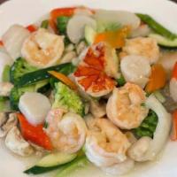  Seafood Combo · ( lobster, jumbo shrimp,imitation crabmeat ,& scallops all sautéed w.fresh vegetables in a d...