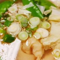 Wonton Soup · Wonton with green vegetables in a chicken broth.