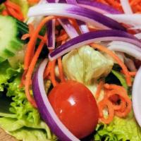 House Green Salad · Tomatoes, cucumber, red onions, carrot, and lettuce with dressing peanut sauce, honey mustar...