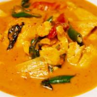 Red Curry ** · Thai red curry coconut milk, bamboo shoots, chili and basil leaves. Served with steamed rice...