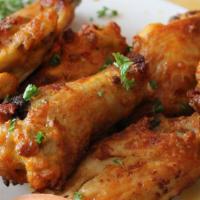 Brick Oven Chicken Wings · Top menu item. Eight wings cooked in our brick oven served with a side of ranch. Choice of b...