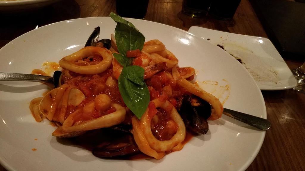 Linguine Frutti Di Mare · Linguine pasta in a fresh tomato sauce with shrimp, scallops, mussels, clams and calamari.