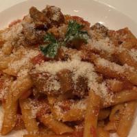 Penne Siciliana · Penne pasta with fresh tomatoes, basil, eggplant, olive oil and garlic in a light tomato sauce