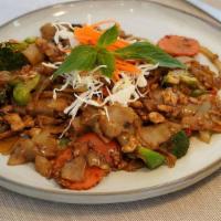 Pad Kee Mow · Fresh big flat noodles stir-fried with choice of meat, garlic-chili pepper, sweet Thai basil...