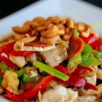 Pad Cashew Nut · Sautéed choice of meat with onions, pineapples, baby corn, mushrooms, carrots, and bell pepp...
