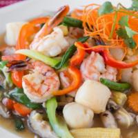Shrimp Love Scallops · Sautéed shrimps and scallops with ginger, mushrooms, carrots, celery, bell peppers, onions a...