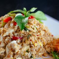 Spicy Fried Rice* · Thai style fried rice with sautéed choice of meat, basil leaves, spice, bell peppers, eggs, ...