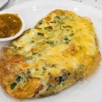 Santa Fe Omelette · Zesty southwestern omelet with a medley of fresh onions, cilantro, tomatoes, and jalapeño pe...