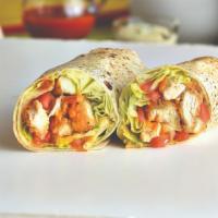 Buffalo Crispy Chicken Wrap · Crispy Buffalo chicken, romaine lettuce and tomatoes. Served with a side of blue cheese dres...