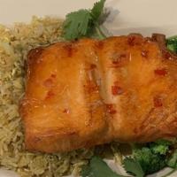 Crispy Salmon / Cá Hồi · Fresh salmon sears to crispy in sweet and sour sauce served with fried rice and veggies of t...