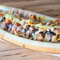 Veggie Dog · Vegetarian. Veggie dog is 1/4lb organic (soy) sausage. It comes fully loaded: cream cheese, ...