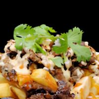Bulgogi Fries · Seasoned fries mixed with a cup of shredded cheese topped with bulgogi (tender Korean Bbq be...