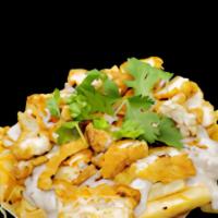 Country Boy Fries · Seasoned fries mixed with a cup of shredded cheese topped with a pork country gravy, chicken...